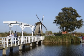 Historic windmill and drawbridge, UNESCO World Heritage Site, Kinderdijk, South Holland,