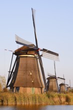 Historic windmills in the evening light, UNESCO World Heritage Site, Kinderdijk, South Holland,