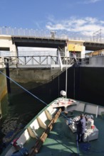 Nile cruise ship enters the lock at the Esna dam, Esna, Egypt