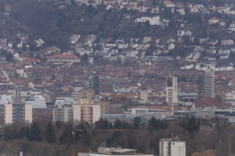 30.03.2018: Zoomed view of city roofs, towers and industrial buildings. Stuttgart,