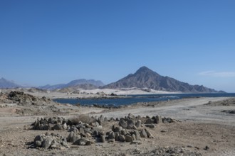 Ancient graves, tombstones, on the coast, Oman