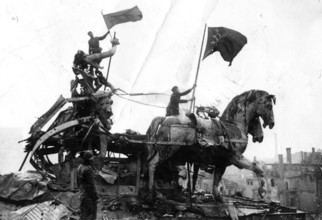J. Chaldej arrived in Berlin with three Soviet flags. The second flag was raised at the Brandenburg