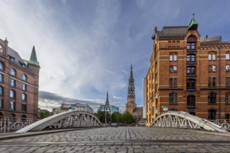 Bridge overlooking St. Katharinen's main church at the blue hour, Speicherstadt, Hamburg, Germany