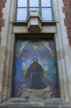 Mosaic of a saint on a church, Krakow, Poland