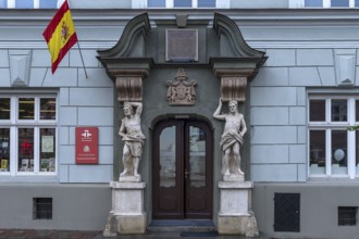 Historic entrance portal with two elecampane, Krakow, Poland