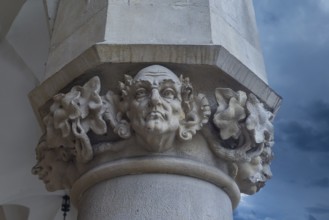 Reliefs on the pillars of the arcades of the Cloth Hall, Main Market Square, Krakow, Poland