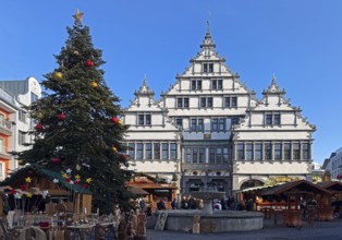 Weser Renaissance style town hall with Christmas market on Rathausplatz, Paderborn,