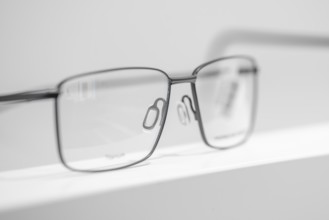 Close-up of a simple, modern metal eyeglass frame, optician, Pforzheim