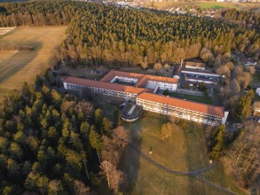 Aerial view of a building complex surrounded by forest in a rural area, rehab clinic, Schömberg,