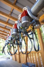 Close-up of safety equipment with straps and metal parts in a wooden structure, Himmelsglück