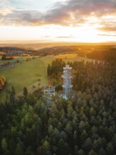 Tower surrounded by forests and meadows at sunset, Himmelsglück observation tower with Flying Fox,