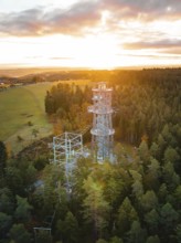 Tower rises above trees early in the morning, Himmelsglück observation tower with Flying Fox,
