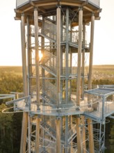 Detailed view of a metallic observation tower in the forest at sunset, Himmelsglück observation