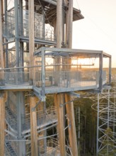 Close-up of a platform of a wooden observation tower at sunset with intricate details, Himmelsglück