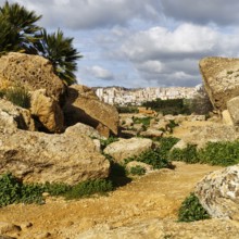 View through boulders of the modern city of Agrigento, Valley of the Temples, Agrigento, Sicily,