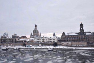 View of Church of Our Lady Dresden in winter, Elbe with ice floes, long exposure, Saxony, Germany