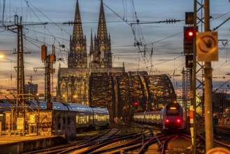 Rail track in front of Cologne Central Station, Hohenzollern Bridge across the Rhine, regional