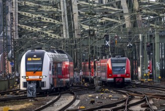 Rail system in front of Cologne Central Station, Hohenzollern Bridge across the Rhine, RRX,