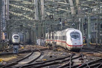 Rail track in front of Cologne Central Station, Hohenzollern Bridge across the Rhine, ICE