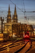 Rail track in front of Cologne Central Station, Hohenzollern Bridge across the Rhine, regional