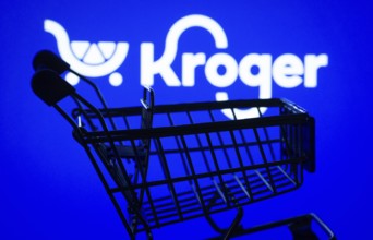 Dhaka, Bangladesh- 03 July 2025: Silhouette of a shopping cart in front of the Kroger logo,