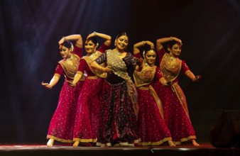 Artists perform a classical dance during a cultural evening program at Shilpgram Mohotsav 2026 in