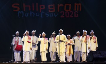 Artists perform 'Ojapali' folk song during a cultural evening program at Shilpgram Mohotsav 2026 in