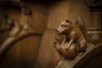 Squirrel with nut, oak choir stalls for monks' hour prayers, 1493 by Jörg Syrlin the Younger, also