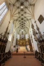 Mother of God on the crescent moon with baby Jesus, elevated on a pedestal, left and right John the