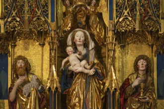 Mother of God on the crescent moon with baby Jesus, left and right John the Baptist and John the