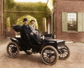 Thomas Edison and Mr. Greenfeldt in a Baker electric automobile, 1910, digitally edited