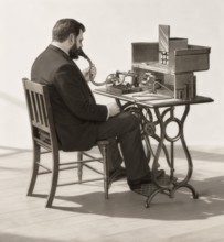 Historical illustration, 19th Century, Dictation with a Cylinder Phonograph by Thomas Alva Edison