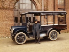 Thomas Alva Edison inspecting a Lansden Electric truck which used Edison batteries, digitally