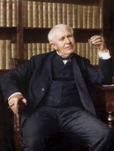 Thomas Alva Edison examining his phonograph recording apparatus, digitally edited