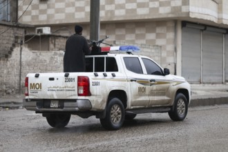 In Al Tabqah, Syria on January 18, 2026, a convoy of Syrian Government forces deploys throughout