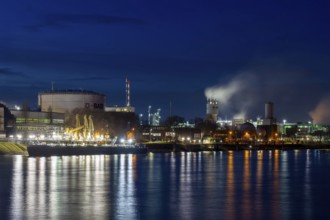 Evening shot of BASF in Ludwigshafen with the Rhine in the foreground