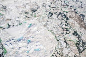 Aerial view of melting icepack and icebergs, Greenland (Kalaallit Nunaat), Arctic Ocean, climate