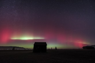 Northern lights, aurora borealis, solar storm, January 2026, red, green, hut, Loisach-Lake
