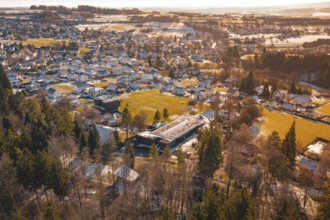 Winter landscape of a small town with snow-covered roofs and surrounding fields, Hallwangen,