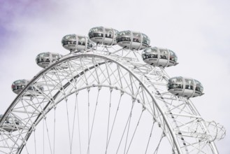 Close-up of the tip of a Ferris wheel, the capsules are clearly visible, London Eye, London, United