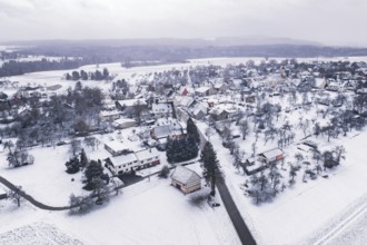 Snowy village in a wintry landscape, surrounded by trees and fields, Wiesenstetten, Freudenstadt