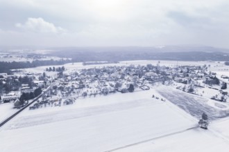 Winter panorama of a snowy village with surrounding fields, Wiesenstetten, Freudenstadt district,
