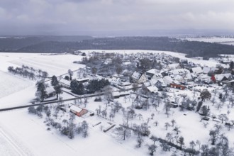 Wintery village landscape with snow-covered houses and trees, cold atmosphere, Wiesenstetten,