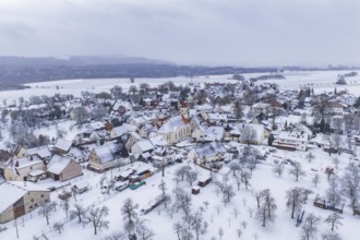 Overview of a snowy village in winter, central church, icy atmosphere, Wiesenstetten, Freudenstadt