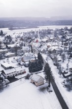 Wintery village with snow-covered houses and trees, cold landscape atmosphere, Wiesenstetten,