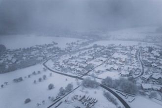 Snowy landscape with villages and fields under a foggy winter sky, Hörschweiler, Freudenstadt