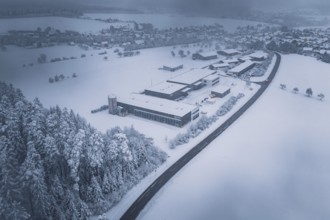 Snowy landscape with forest, surrounding villages and a factory in the foreground, Hörschweiler,