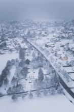 A quiet, wintry landscape with snowy fields and remote roads, Schopfloch, Freudenstadt district,