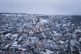 Snowy urban view with densely packed houses and winter views, Altensteig, Calw district, Germany