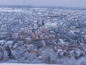 Snowy city landscape with colorful half-timbered houses and winter flair, Altensteig, Calw